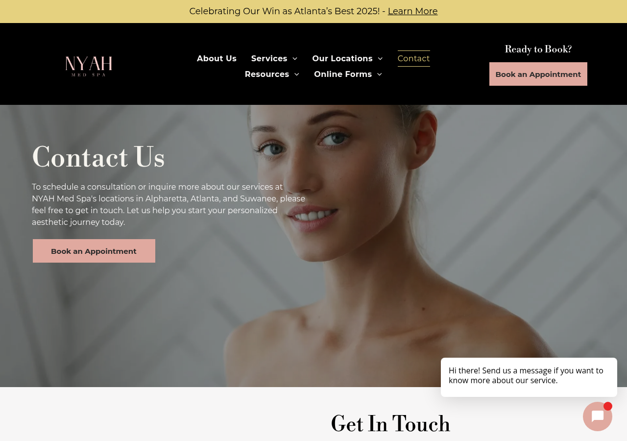 Screenshot of Contact Us | Alpharetta, GA | NYAH Med Spa
a black map pin with a hole in the middle on a white background .